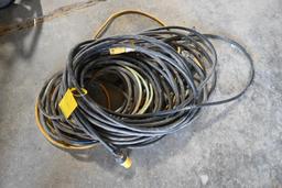 Assortment of jumper cables & extension cords