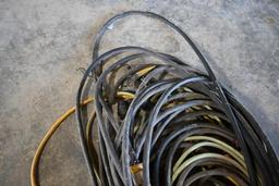 Assortment of jumper cables & extension cords