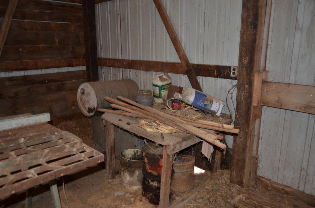 Older table saw, older water tank, primitive wooden cabinet, etc.