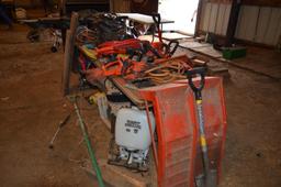 Electric trimmers, older battery charger, grinder, etc. includes wooden table in lot