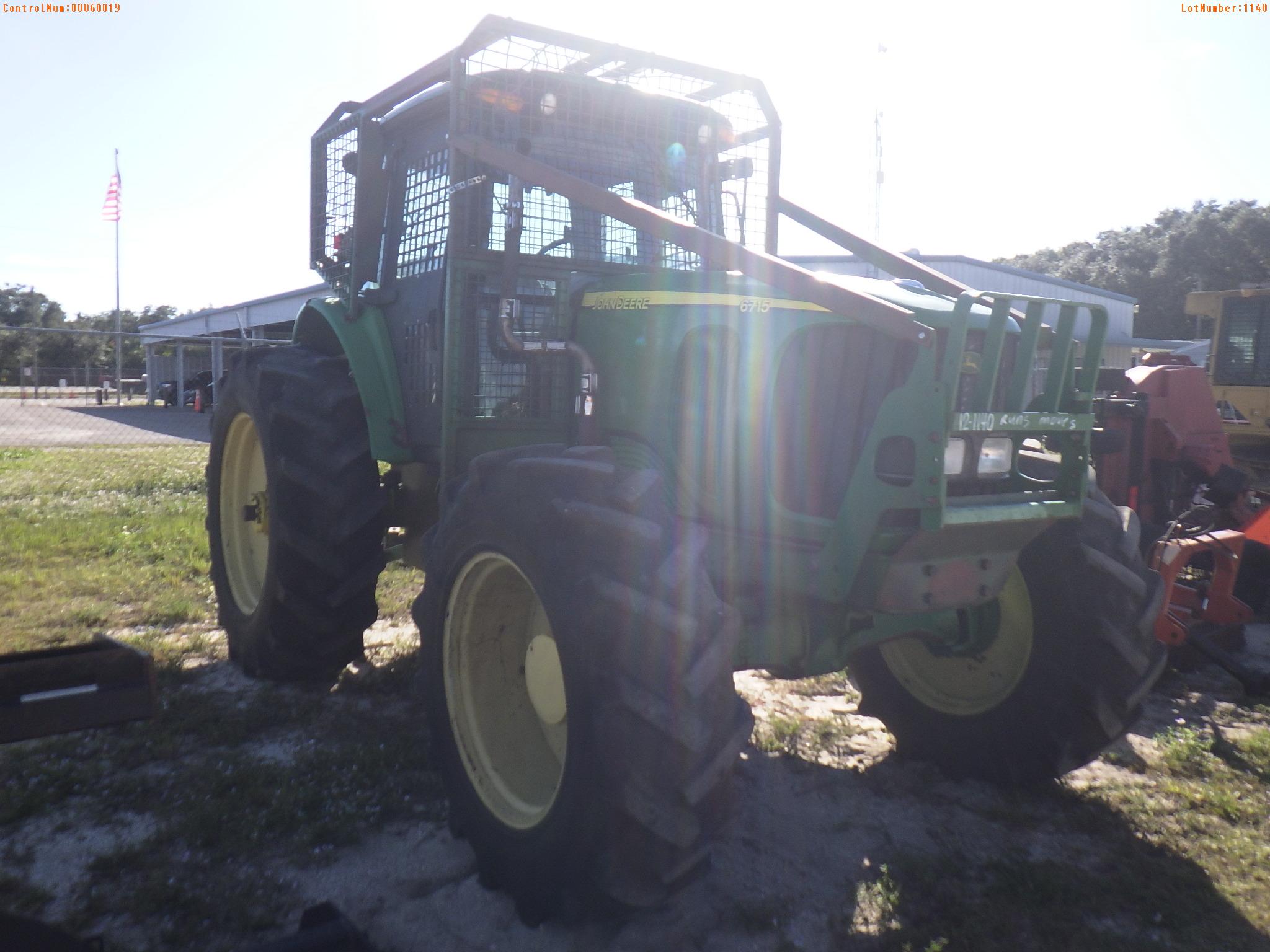 12-01140 (Equip.-Tractor)  Seller:Private/Dealer JOHN DEERE 6715 4WD DIESEL ENCL