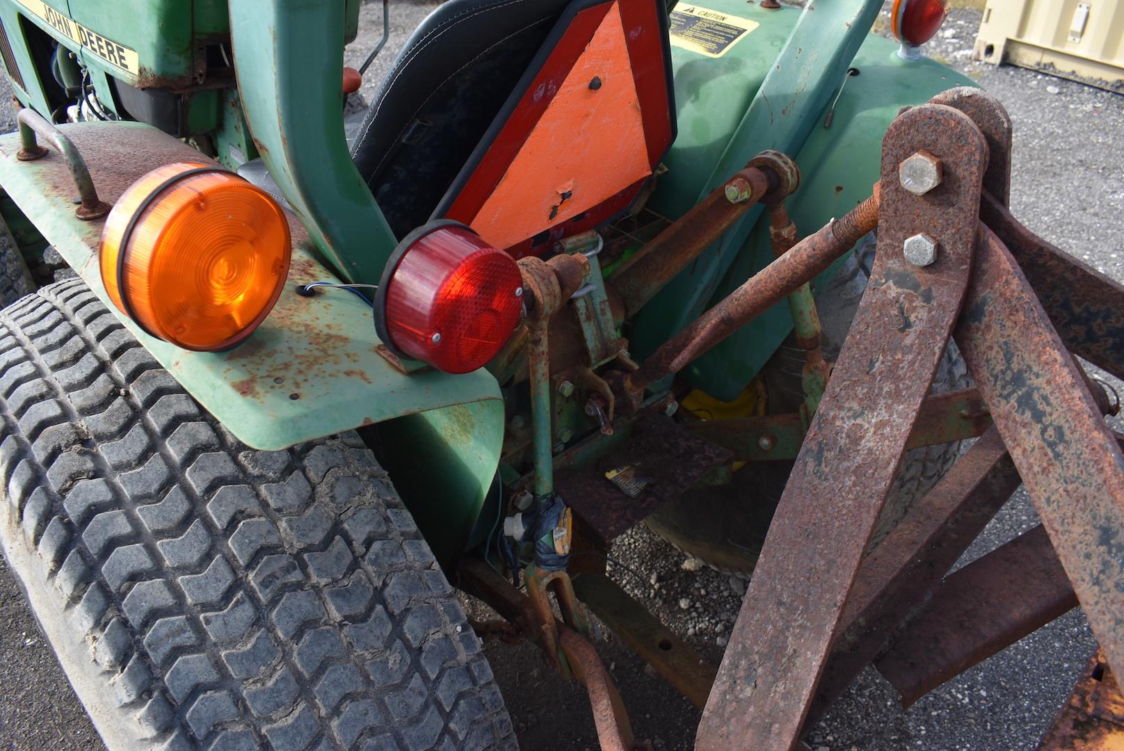 John Deere 750 4x4 Tractor with Box Blade