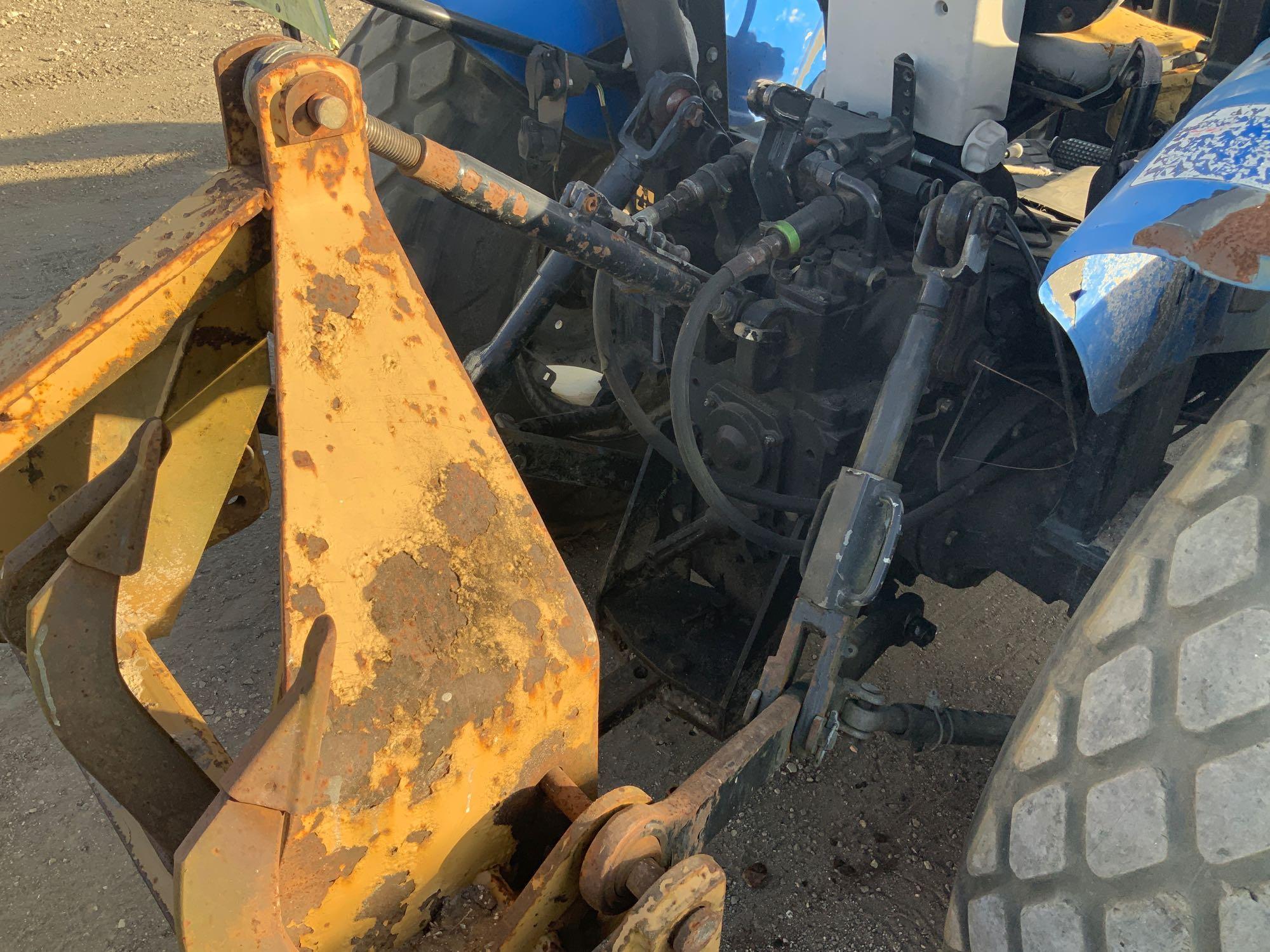 New Holland TN60A Tractor Loader with Box Blade