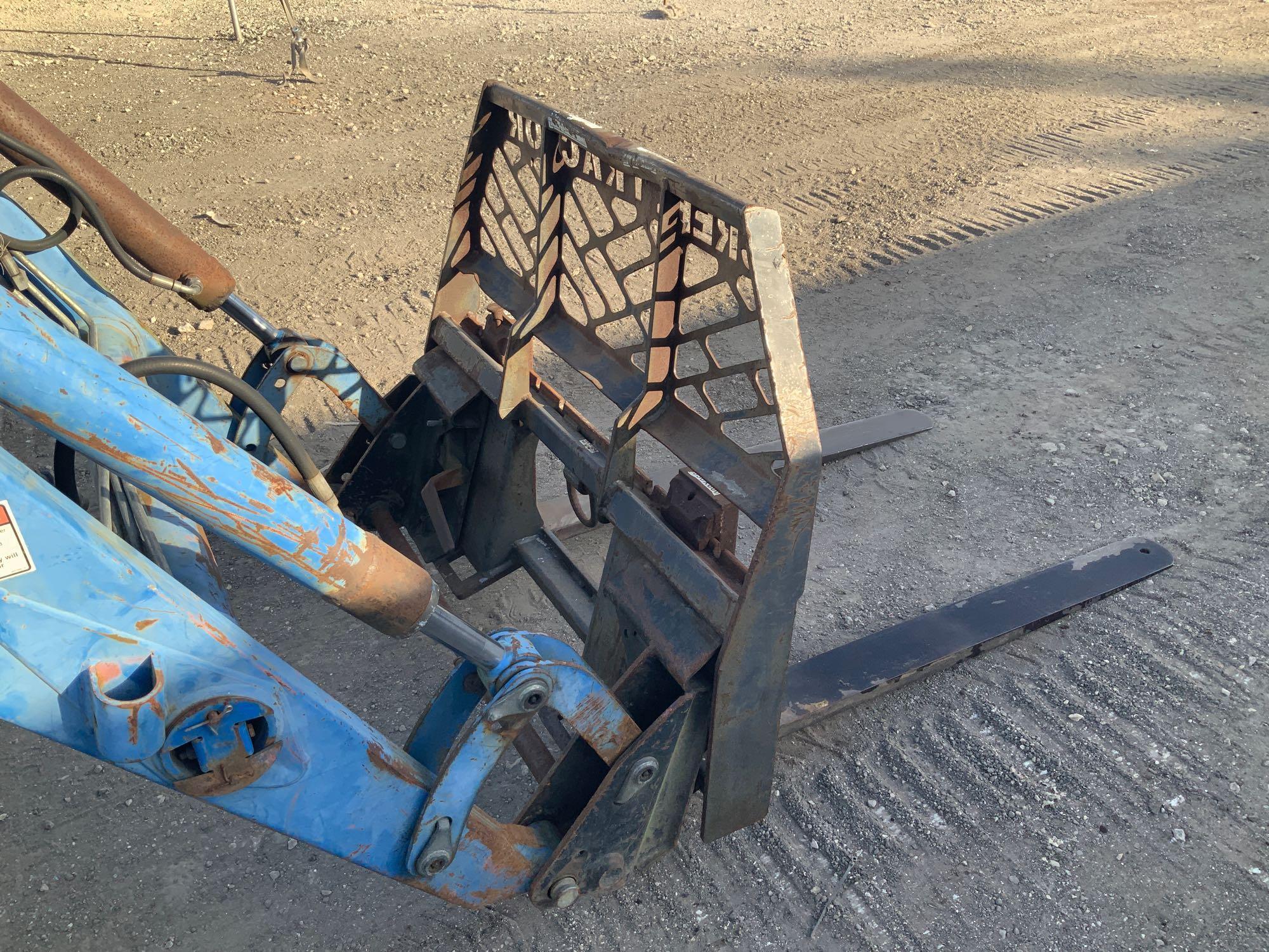 New Holland TN60A Tractor Loader with Box Blade