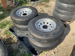 4 Unused 235/80R16 Tires w/wheels