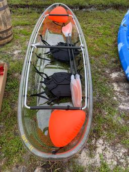 Two person, see through canoe w/ paddles
