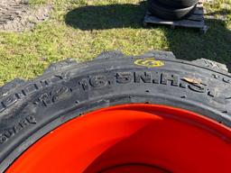 4 Unused Skid Steer Tires With Wheels