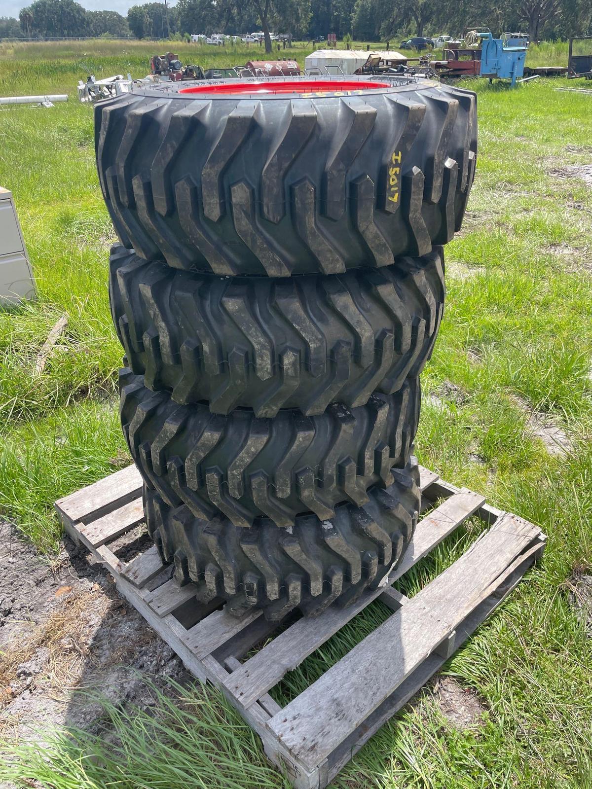 Four Unused Camso 12-16.5 Skid Steer Tires and Wheels