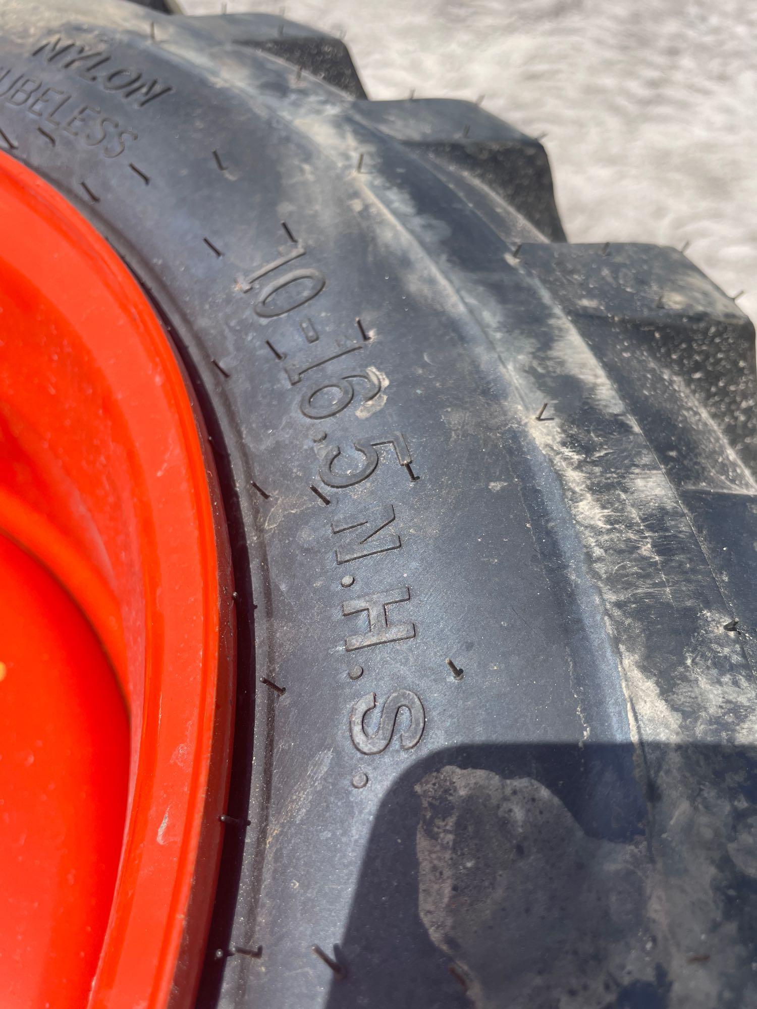 Four Unused Camso 10-16.5 Skid Steer Tires and Wheels