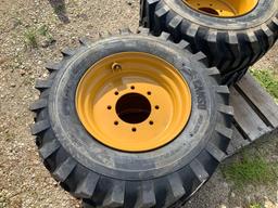 Four Unused 12-16.5 Tires with Rims