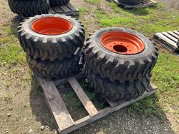 Four Unused 10-16.5 Tires with Rims