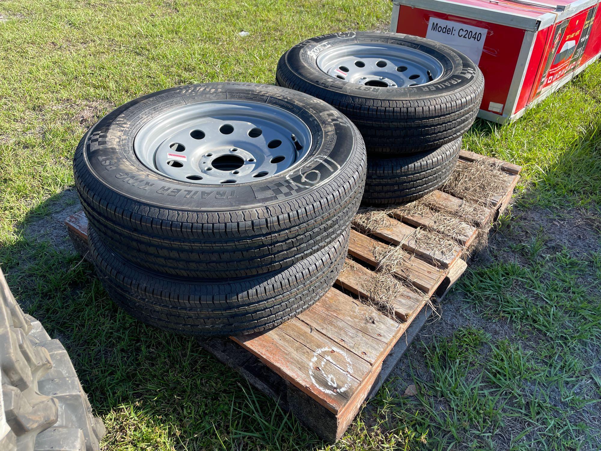 Four Unused 205/75R15 Trailer Tires and Wheels