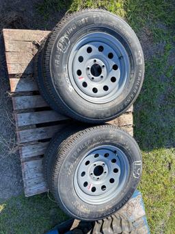 Four Unused 205/75R15 Trailer Tires and Wheels