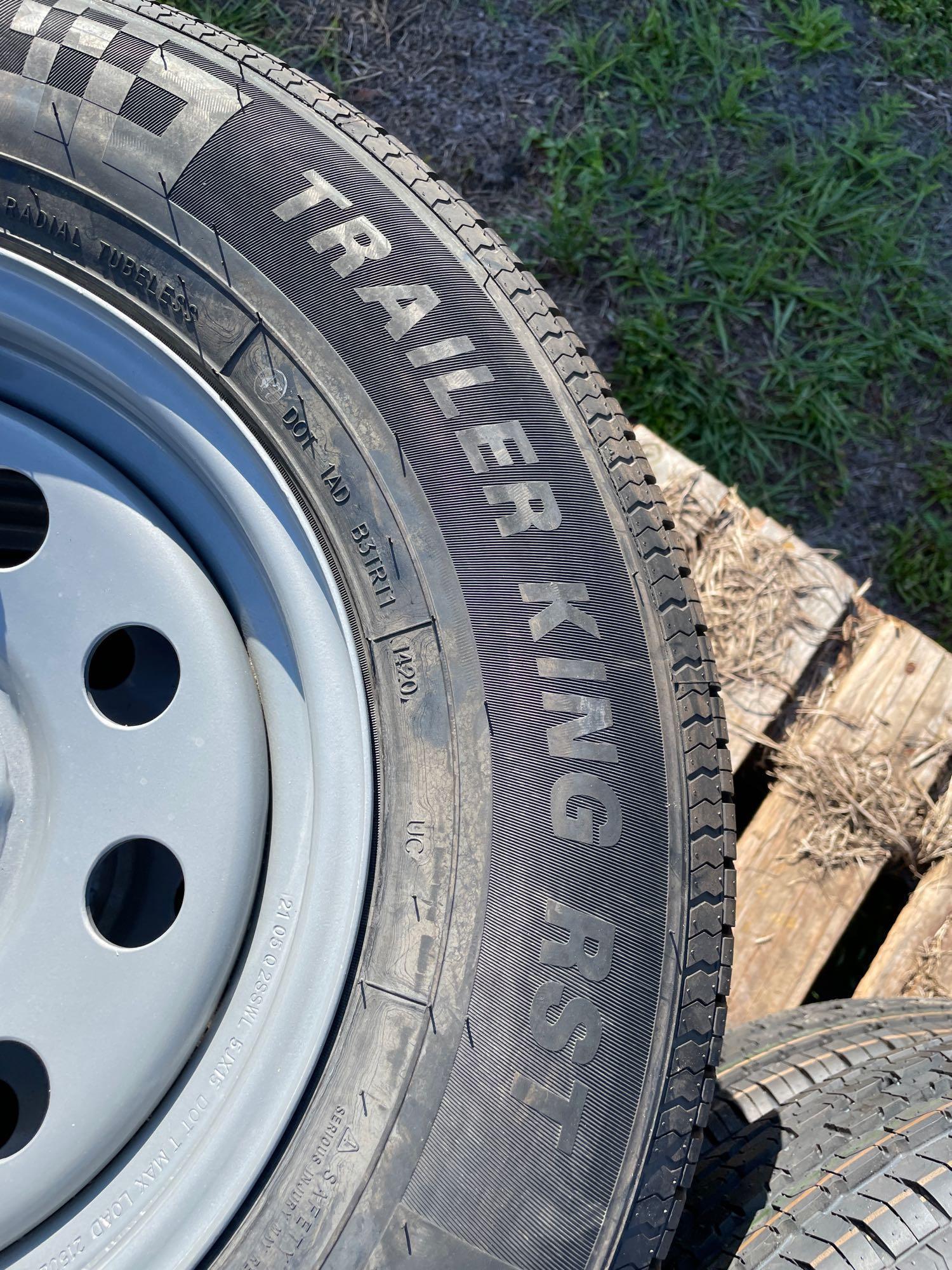 Four Unused 205/75R15 Trailer Tires and Wheels