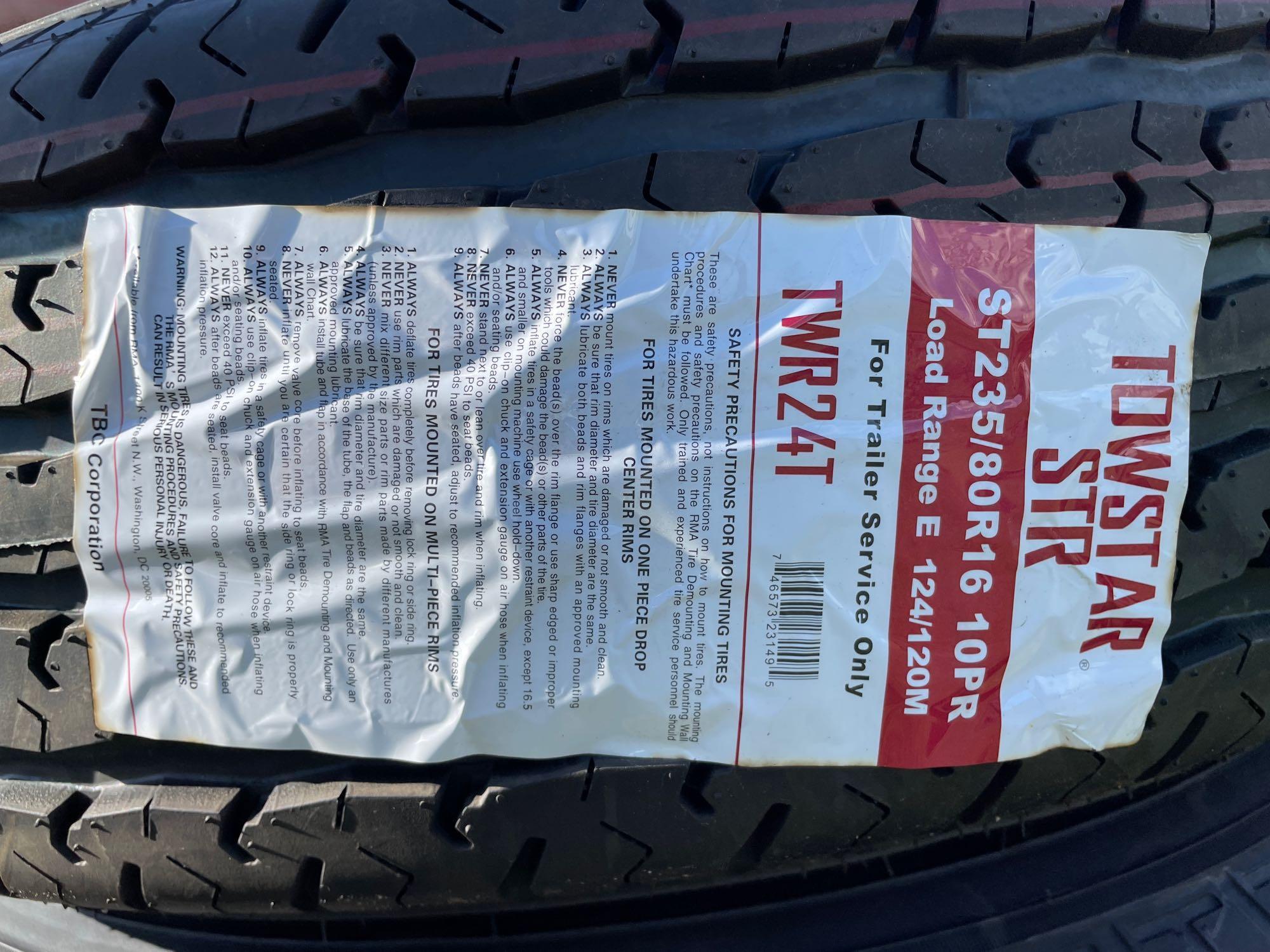 Four Unused ST235/80R16 Trailer Tires and Wheels