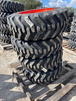 Four Unused 10-16.5 Skid Steer Wheels and Tires