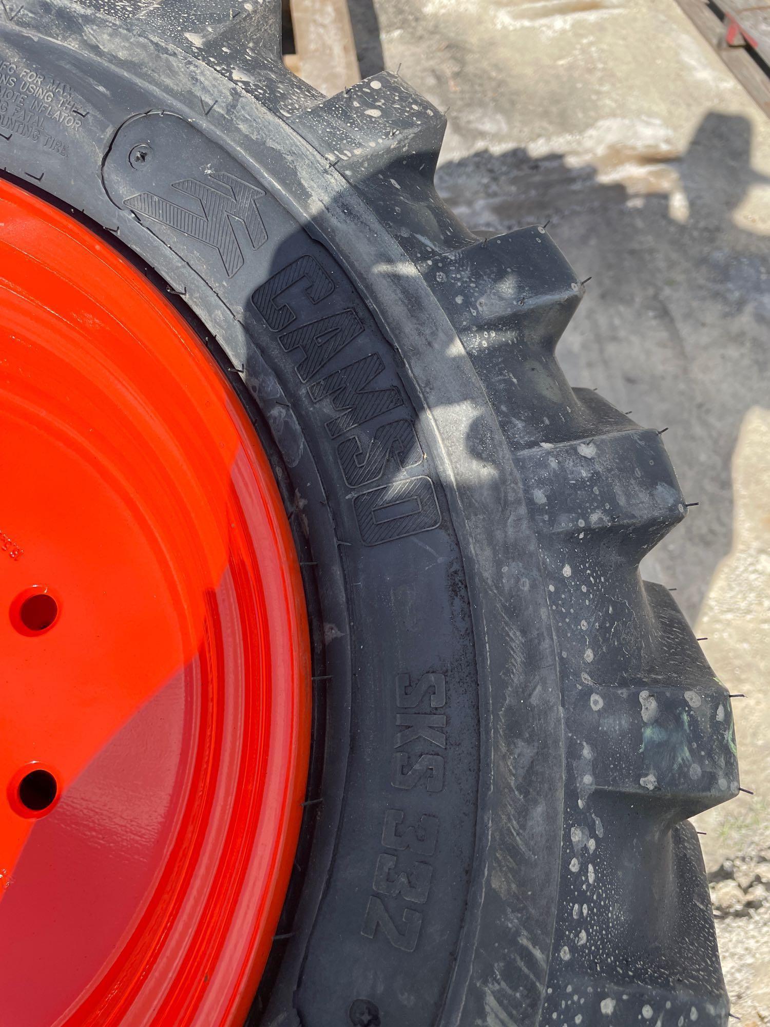 Four Unused 10-16.5 Skid Steer Wheels and Tires