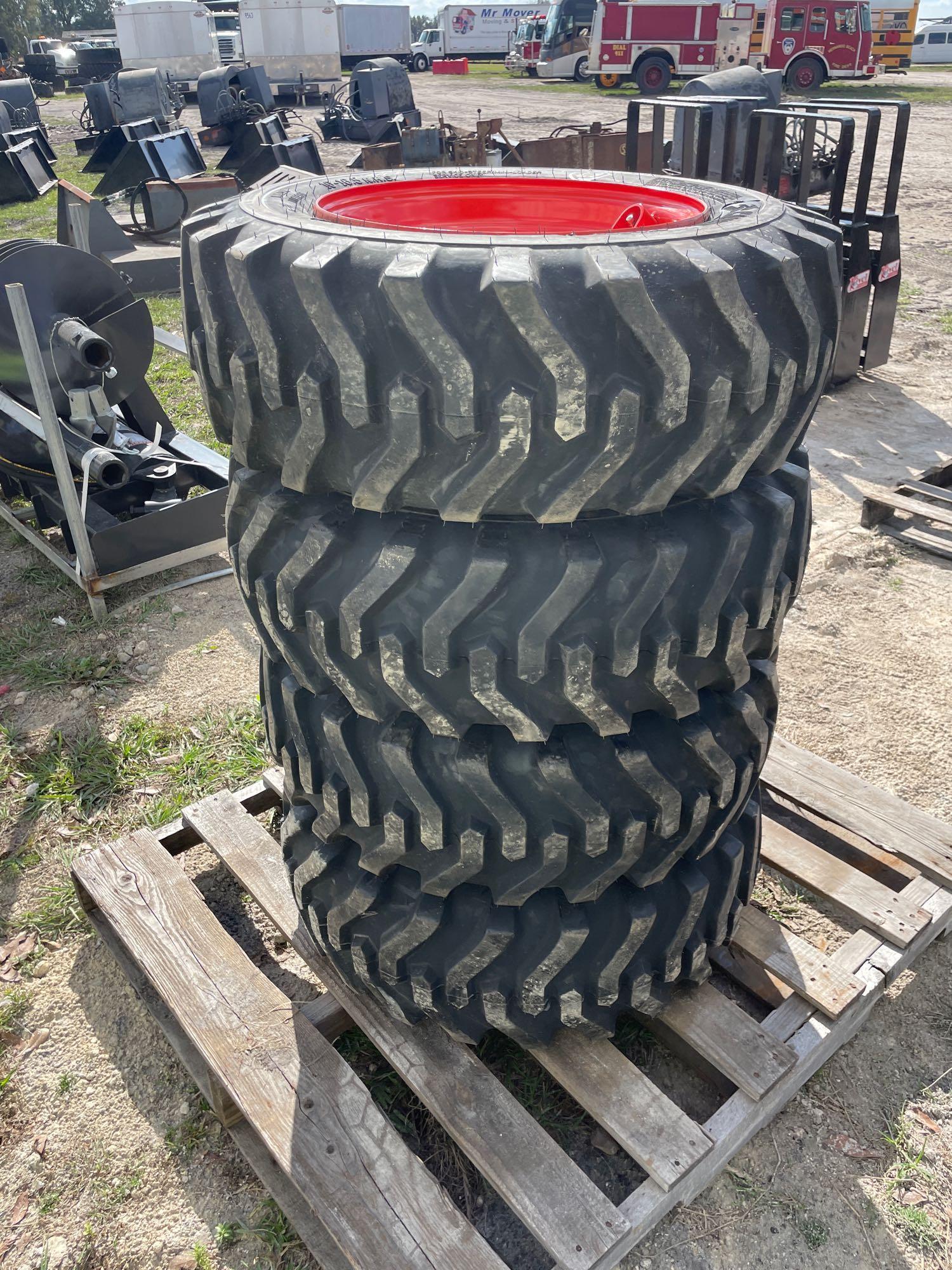 Four Unused 10-16.5 Skid Steer Wheels and Tires