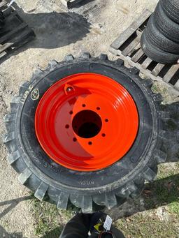 Four Unused 10-16.5 Skid Steer Wheels and Tires