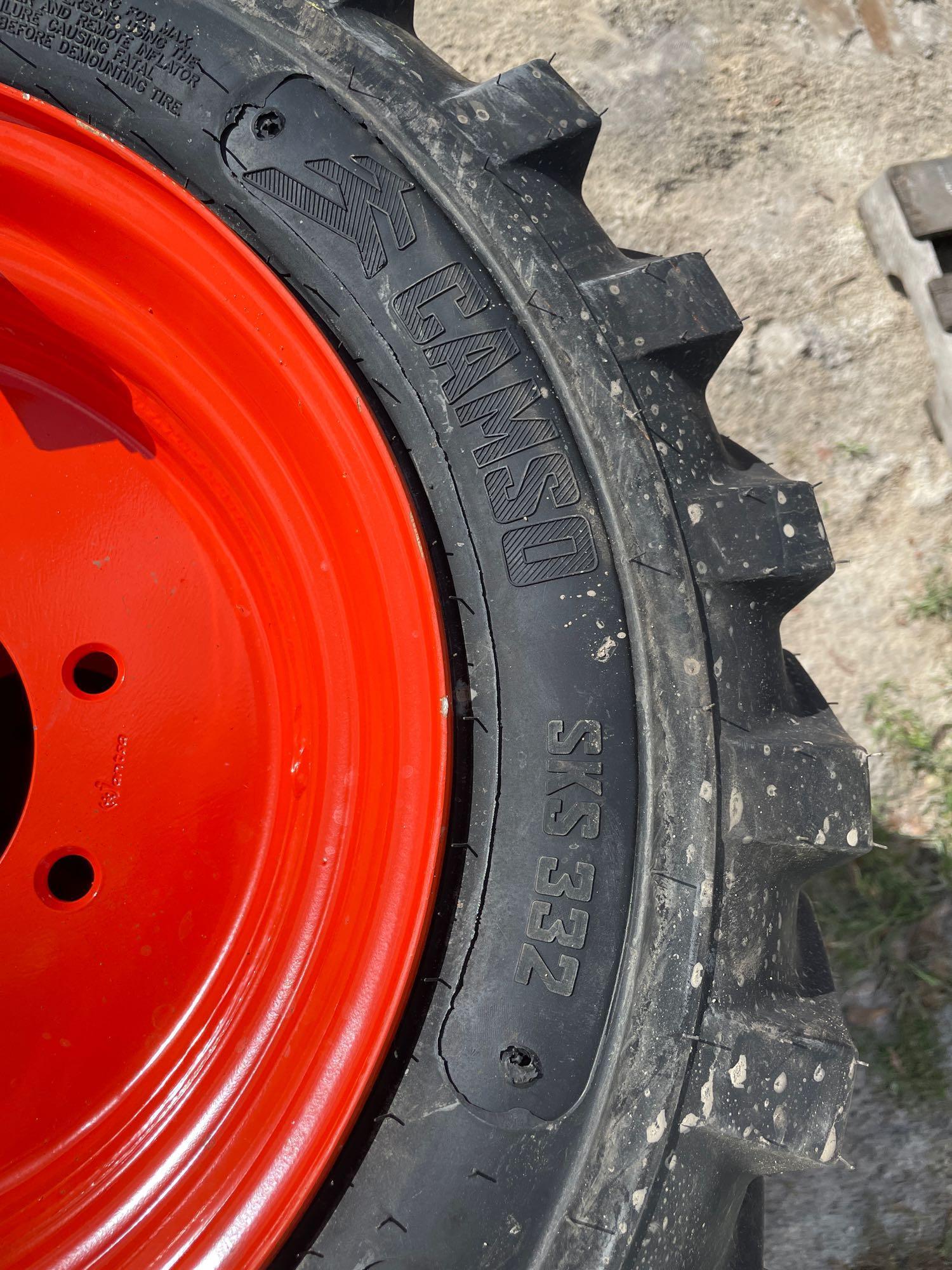 Four Unused 10-16.5 Skid Steer Wheels and Tires