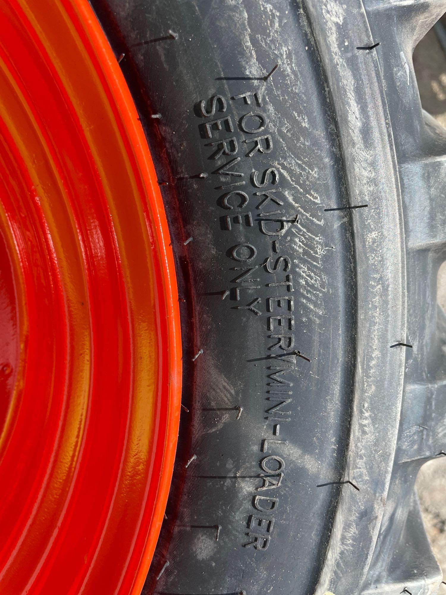 Four Unused 10-16.5 Skid Steer Wheels and Tires