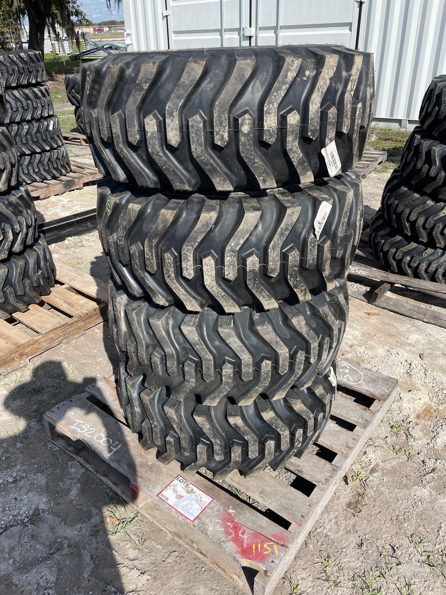 Four Unused 12-16.5 Skid Steer Wheels and Tires