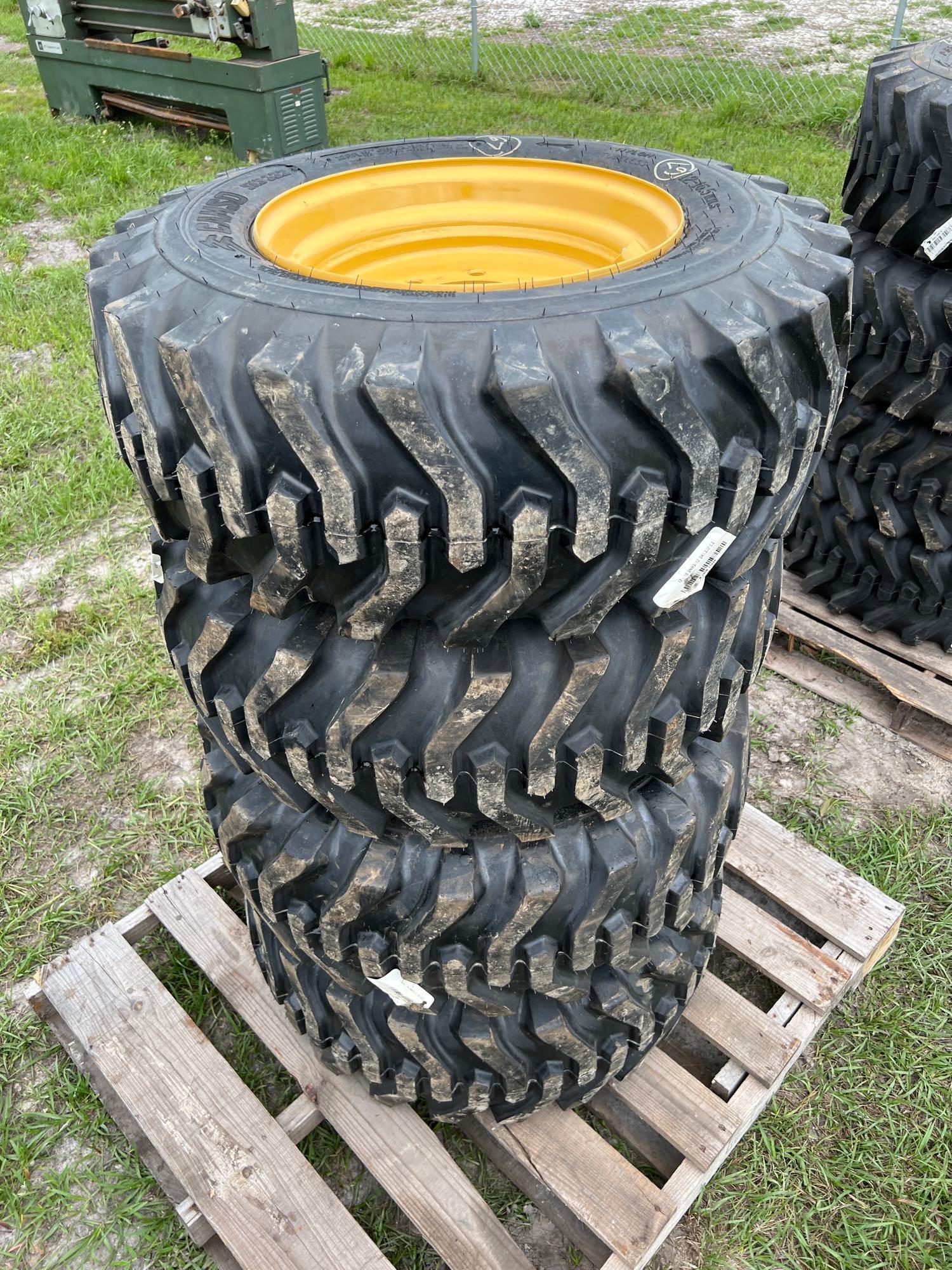 Four Unused Camso 12-16.5 Skid Steer Wheels and Tires