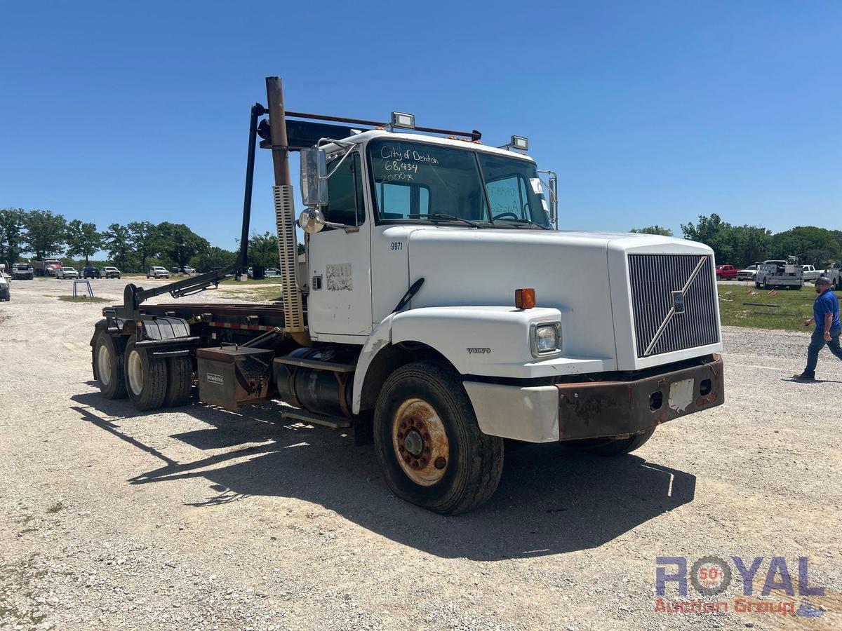 2000 Volvo WG64 McClain EZ Pack MMH60TS 60000lbs T/A Rolloff Truck