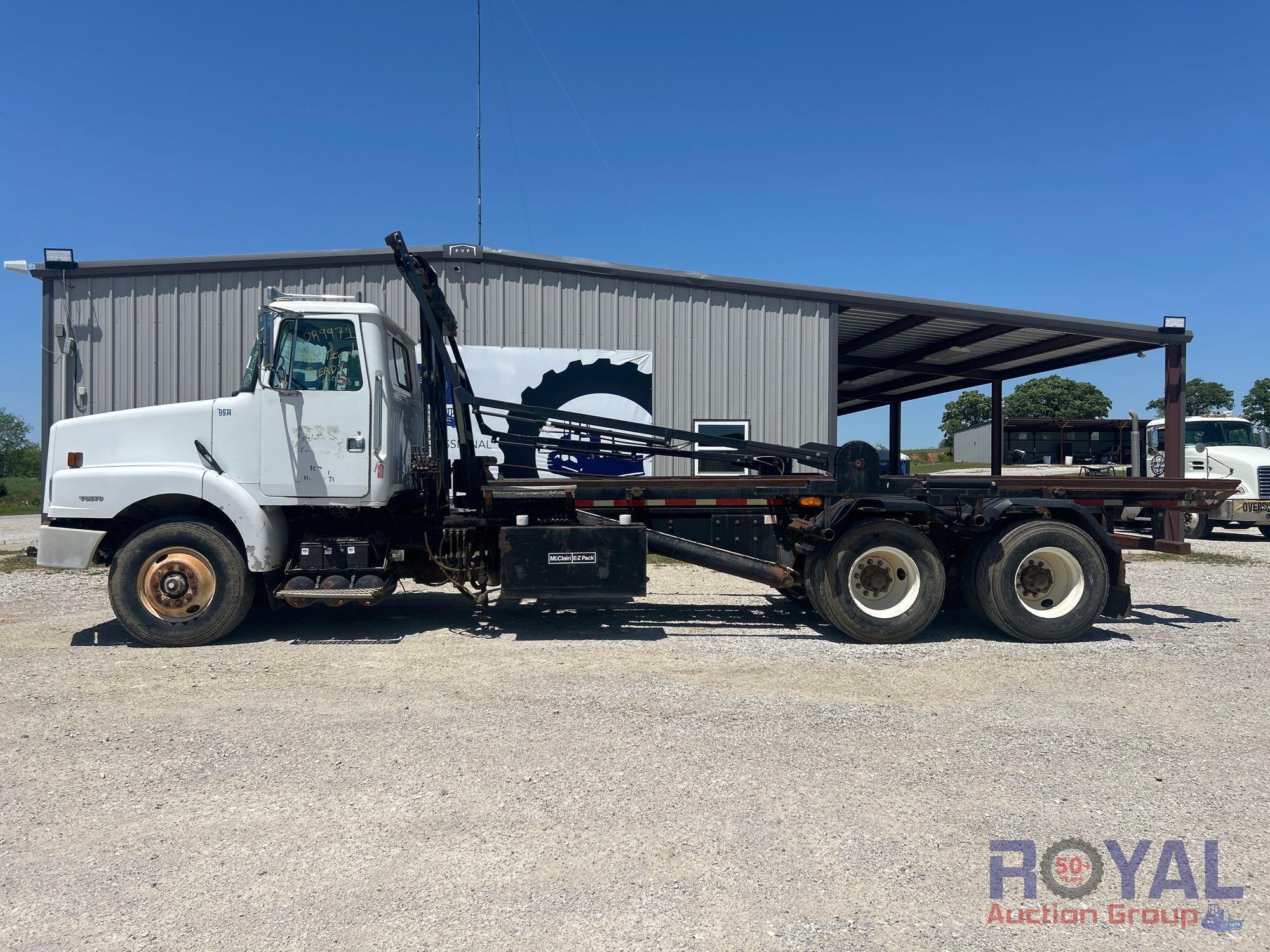 2000 Volvo WG64 McClain EZ Pack MMH60TS 60000lbs T/A Rolloff Truck