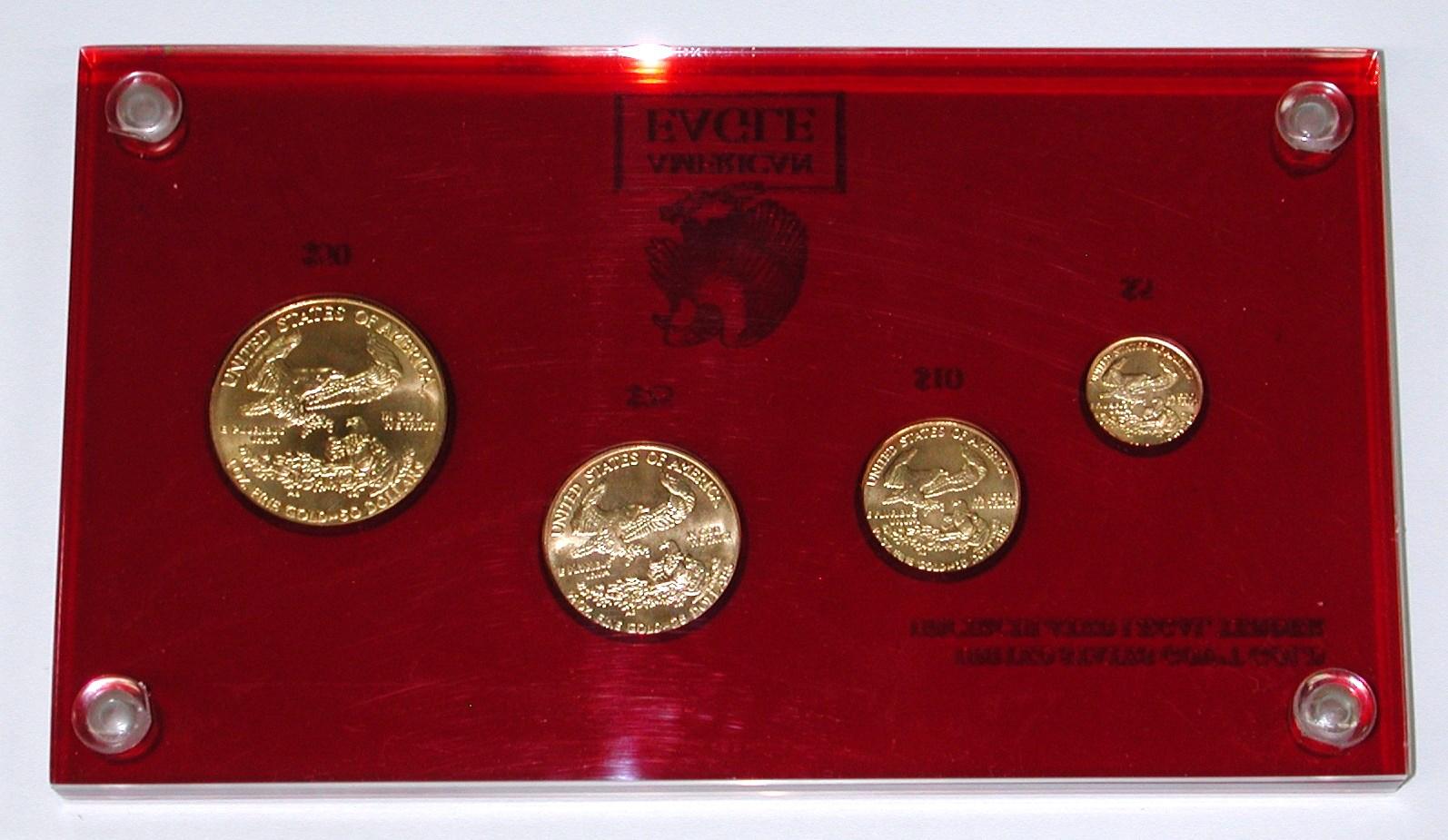1986 FOUR-COIN GOLD EAGLE SET in HOLDER - 1.85 TROY OUNCES TOTAL