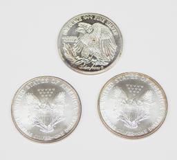 TWO (2) 1995 SILVER EAGLES and 1 oz SILVERTOWNE .999 SILVER ROUND