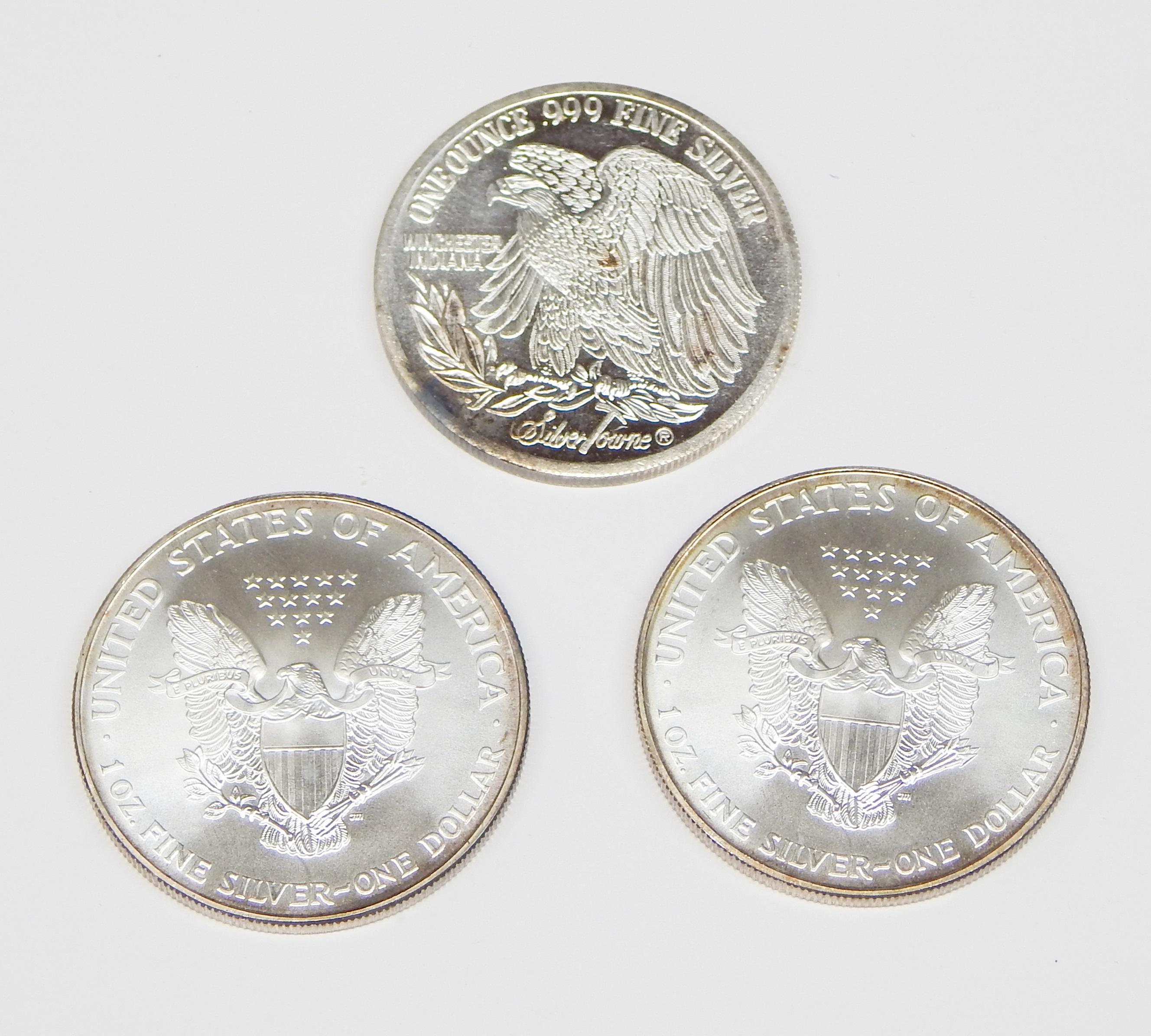 TWO (2) 1995 SILVER EAGLES and 1 oz SILVERTOWNE .999 SILVER ROUND