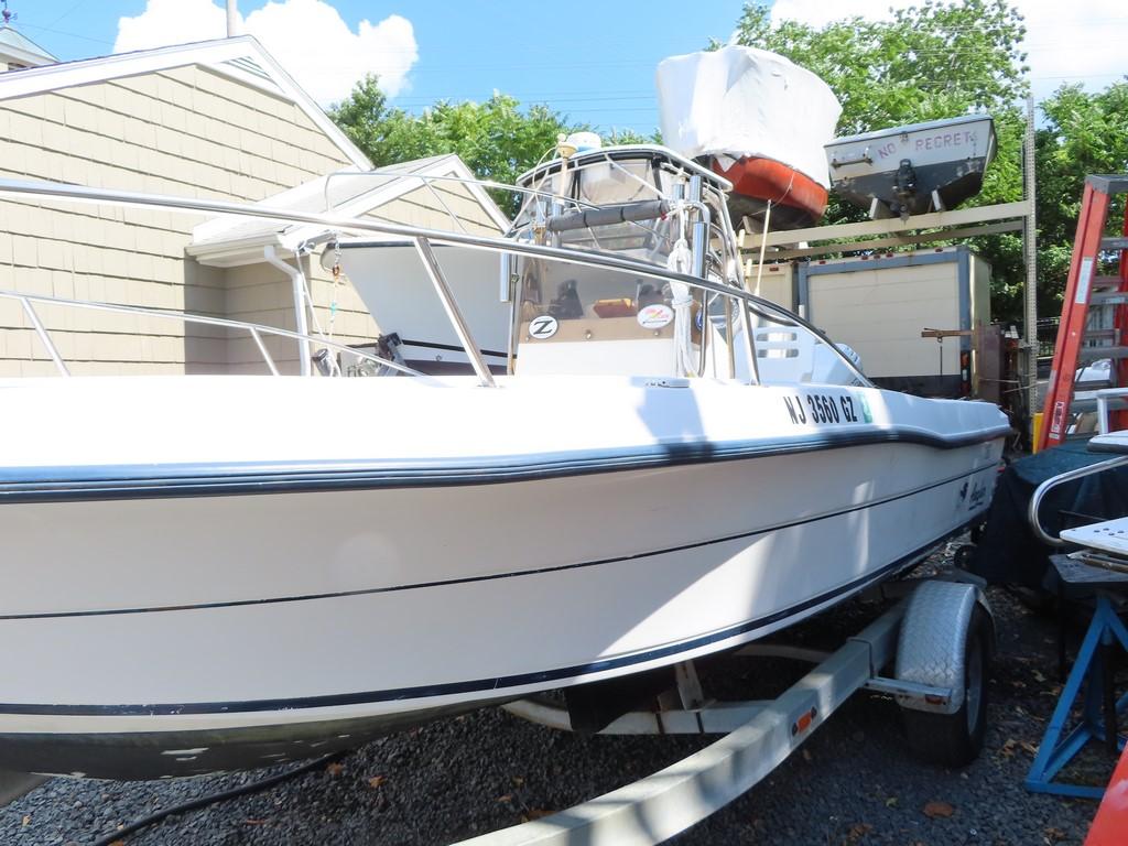 1997 18' Angler Center Console  w/ Trailer (IN WATER RUNNING)