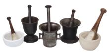 Apothecary Mortar & Pestles (5), three cast iron, one embossed Durch Krieg