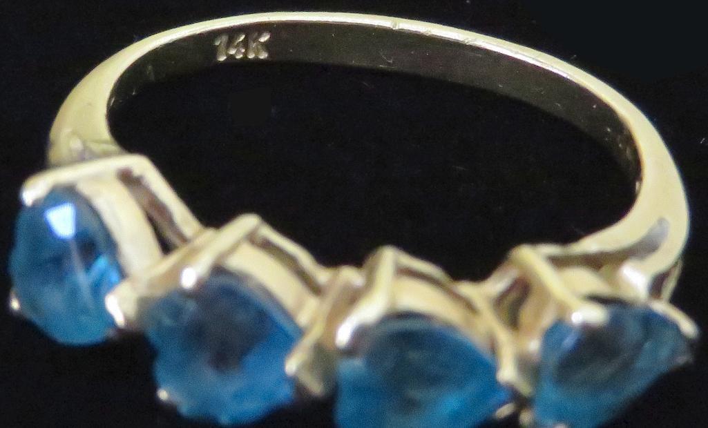 Ring marked 14K with blue stones. Approx 2.8 grams.