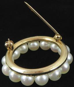 Pin marked 14K with pearls. Approx 3.8 grams.