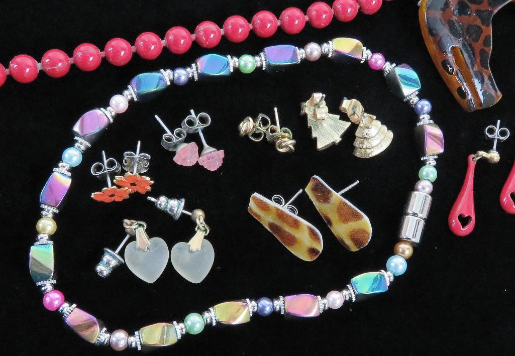 Large assortment of Jewelry includes 10K & 14K, Costume Jewelry, Rings, Necklaces, Earrings and more