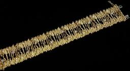 Lady's 22K Yellow Gold Diamond Bracelet. The clasp is a hidden style and is 18K White Gold. Bracelet
