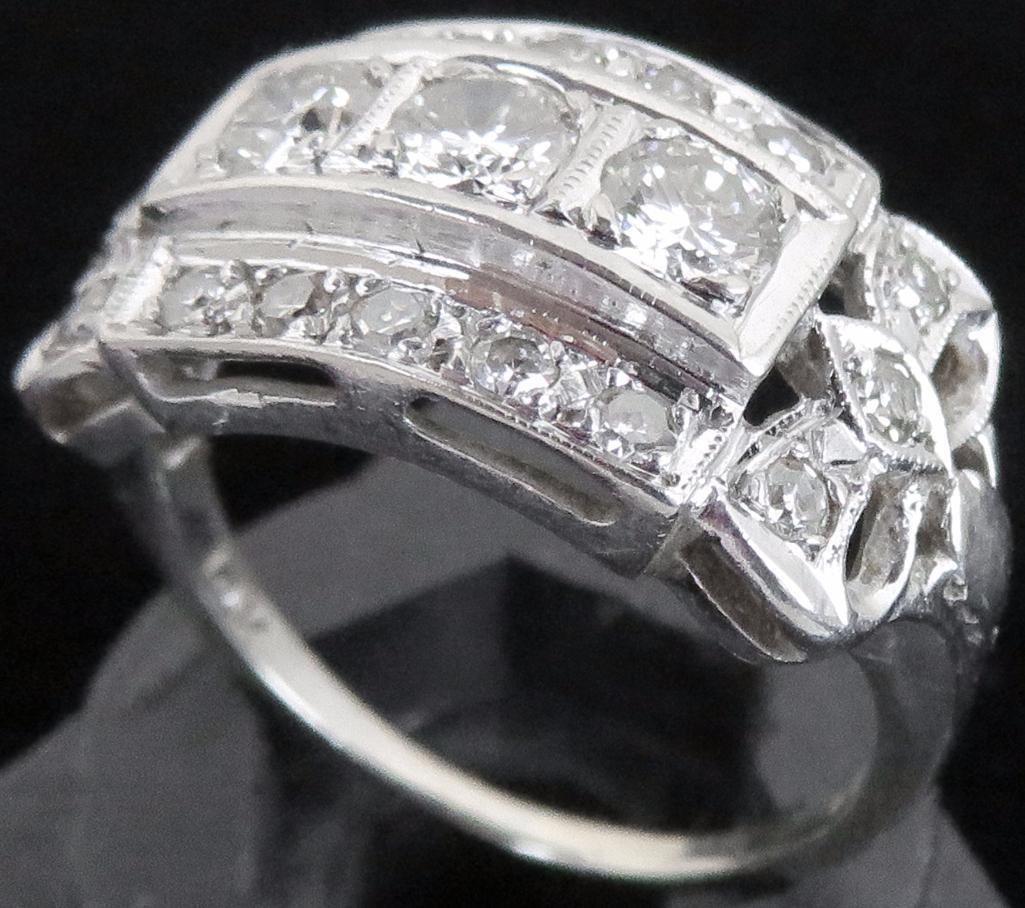 Vintage Lady's 14K white gold Ring with (19) diamonds.