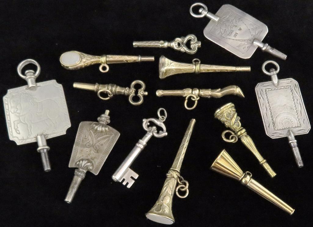 Over (1) dozen antique Watch Keys.