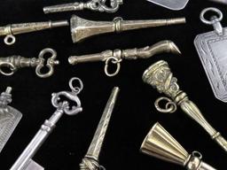 Over (1) dozen antique Watch Keys.