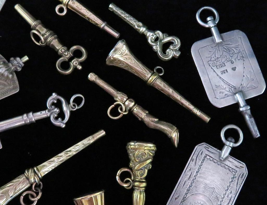 Over (1) dozen antique Watch Keys.