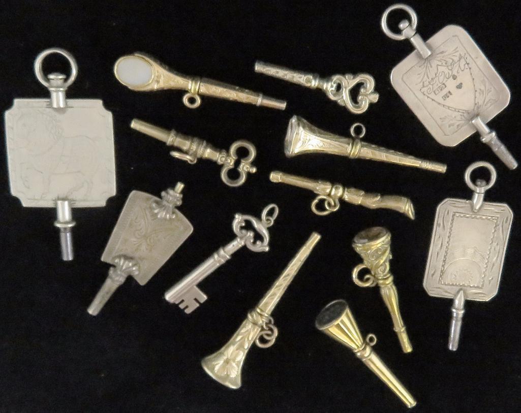 Over (1) dozen antique Watch Keys.