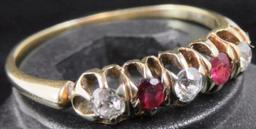 Ring tests 14K with red & clear stones. Approx 1.8 grams.