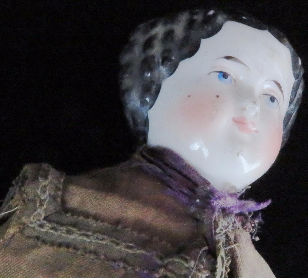 High Brow China Head Doll ca. 1860's. Condition as pictured. Approx 14".