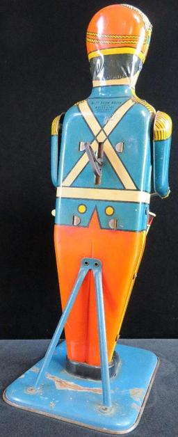 Wolverine Supply & Mfg. Tin Litho No. 27 "Drum Major". approx 13".