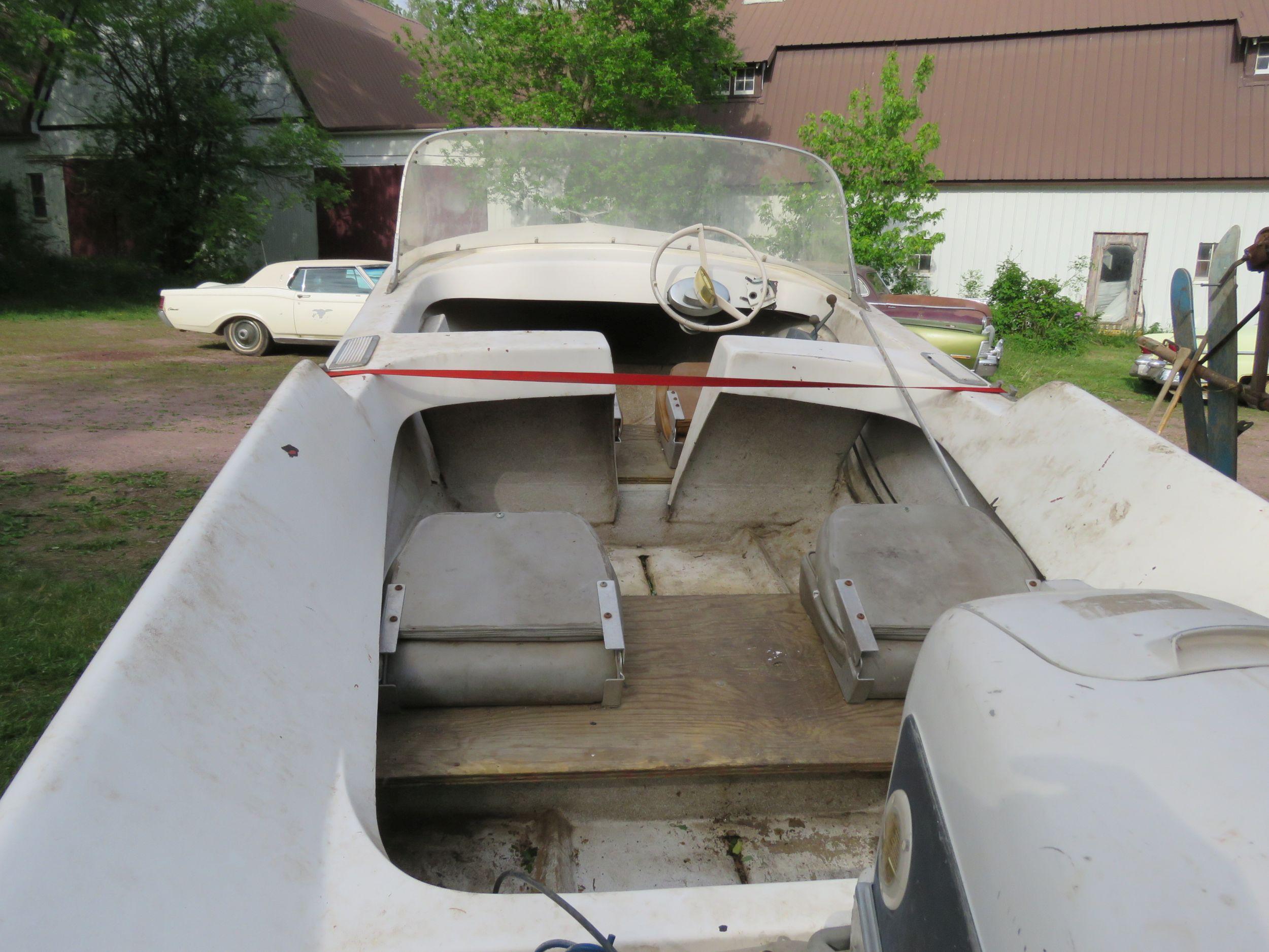 Vintage Boat with Evinrude Starlite 4 fifty outboard motor