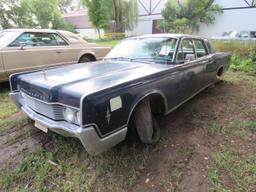 1966 Lincoln Continental 4dr suicide sedan