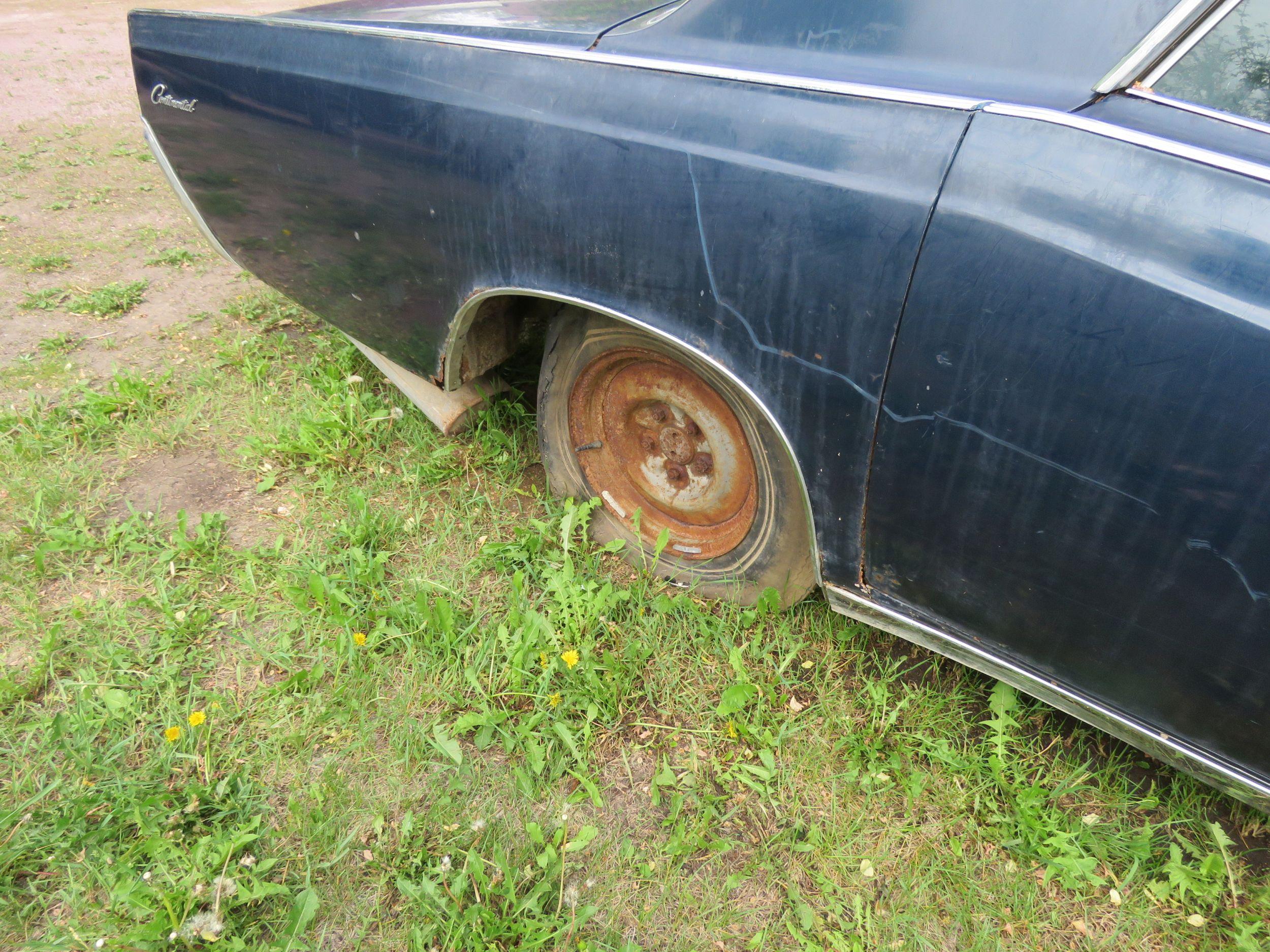 1966 Lincoln Continental 4dr suicide sedan