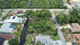 Property 6: 608 Yorkshire Dr, Flagler Beach, FL 32137 Vacant residential 75' x 125' canal front lot